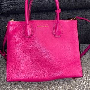 Little bit of creasing. Hot pink. Had for a couple months